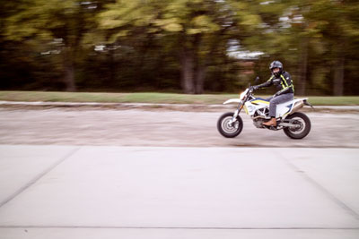 Motion blur image of Rick riding his 701 Husqvarna